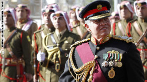 Jordanian King Abdullah II reviews a honor guard upon his arrival at the Parliament of Jordan, on November 3, 2013 in Amman. King Abdullah II opened the17th Parliament's ordinary session and said the influx of hundreds of thousands of Syrian refugees is depleting Jordan's scarce natural resources, and called for international assistance to deal with the problem. AFP/PHOTO/KHALIL MAZRAAWI (Photo credit should read KHALIL MAZRAAWI/AFP/Getty Images)