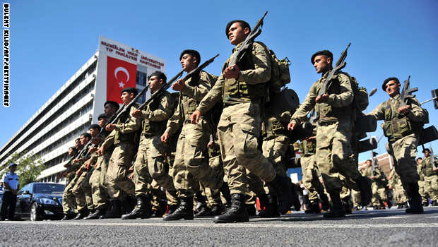 Turkish soldiers march during a military parade marking the 90th anniversary of Victory Day in Istanbul on August 30, 2012. Turkey commemorates the anniversary of the day in 1922 that marked the end of Turkey's independence war with a victory over Greek occupation troops in Anatolia. AFP PHOTO/BULENT KILIC (Photo credit should read BULENT KILIC/AFP/GettyImages)