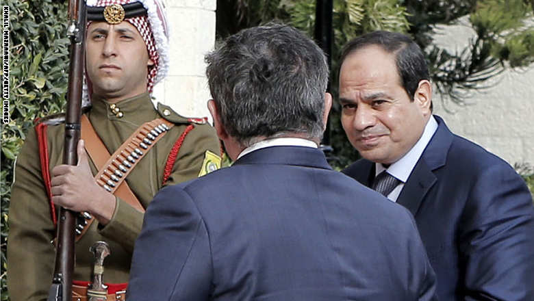 Jordan's King Abdullah II (C) speaks with Egypt's President Abdel Fattah al-Sisi as they arrive at the Royal Palace in Amman on December 11, 2014. Egyptian President Abdel Fattah al-Sisi is on an official visit to Jordan. AFP PHOTO/ KHALIL MAZRAAWI        (Photo credit should read KHALIL MAZRAAWI/AFP/Getty Images)