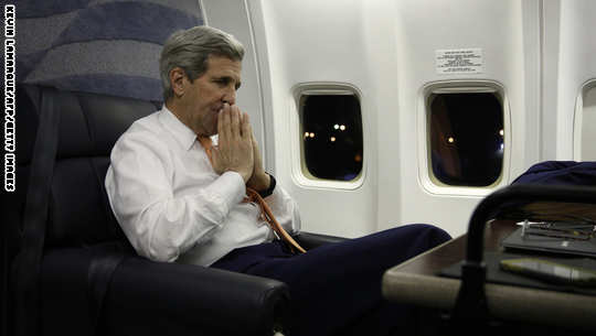 US Secretary of State John Kerry pauses while speaking to journalists about his negotiations with Iran upon his arrival from Vienna at Joint Base Andrews in Washington on January 17, 2016.  Iran has "opened a new chapter" in its ties with the world, President Hassan Rouhani said Sunday, hours after sanctions were lifted under its historic nuclear deal with global powers. The United States lifted a raft of sanctions, with Secretary of State John Kerry saying in Vienna: "The United States, our friends and allies in the Middle East, and the entire world are safer because the threat of the nuclear weapon has been reduced." The lifting of the sanctions will allow Iran to resume widespread oil exports, long the lifeblood of its economy though Rouhani has steadily moved away from relying on crude to fund budgets.  / AFP / POOL / KEVIN LAMARQUE        (Photo credit should read KEVIN LAMARQUE/AFP/Getty Images)