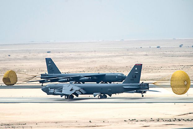 A pair of U.S. Air Force B-52 Stratofortress bombers from Barksdale Air Force Base, Louisiana, taxi after landing at Al Udeid Air Base, Qatar, April 9, 2016.  The U.S. Air Force deployed B-52 bombers to Qatar on Saturday to join the fight against Islamic State in Iraq and Syria, the first time they have been based in the Middle East since the end of the Gulf War in 1991.  REUTERS/U.S. Air Force/Staff Sgt. Corey Hook/Handout via Reuters THIS IMAGE HAS BEEN SUPPLIED BY A THIRD PARTY. IT IS DISTRIBUTED, EXACTLY AS RECEIVED BY REUTERS, AS A SERVICE TO CLIENTS. FOR EDITORIAL USE ONLY. NOT FOR SALE FOR MARKETING OR ADVERTISING CAMPAIGNS