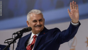 ANKARA, TURKEY - MAY 22: The newly elected chairman of Turkey's ruling Justice and Development (AK) Party Binali Yildirim wave to the members of his party after the Extraordinary Congress, on May 22, 2016 in Ankara, Turkey. 60-year-old new AK Party chairman Binali Yildirim is now set to replace Ahmet Davutoglu as the countrys prime minister. (Photo by Gokhan Tan/Getty Images)